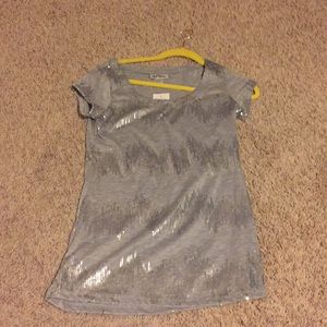 Awesome silver shirt.